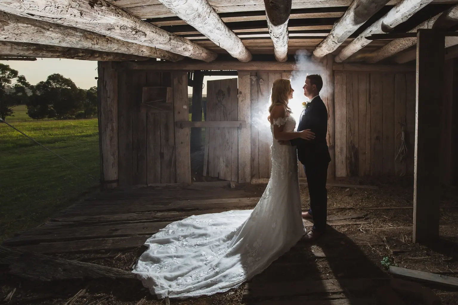 Wedding portrait in a rustic timber barn